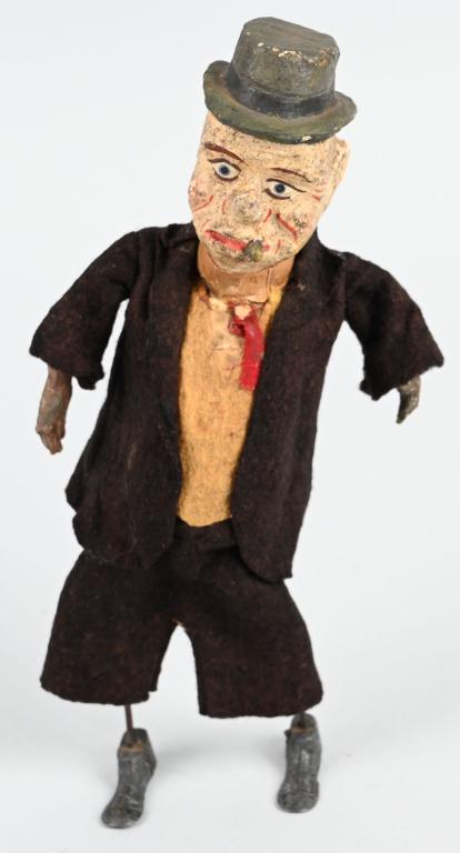 GERMAN WINDUP COMPOSITION MAN WITH CIGAR: All original felt dressed composition man with cigar with lead feet. Windup works. 8 1/2" Excellent