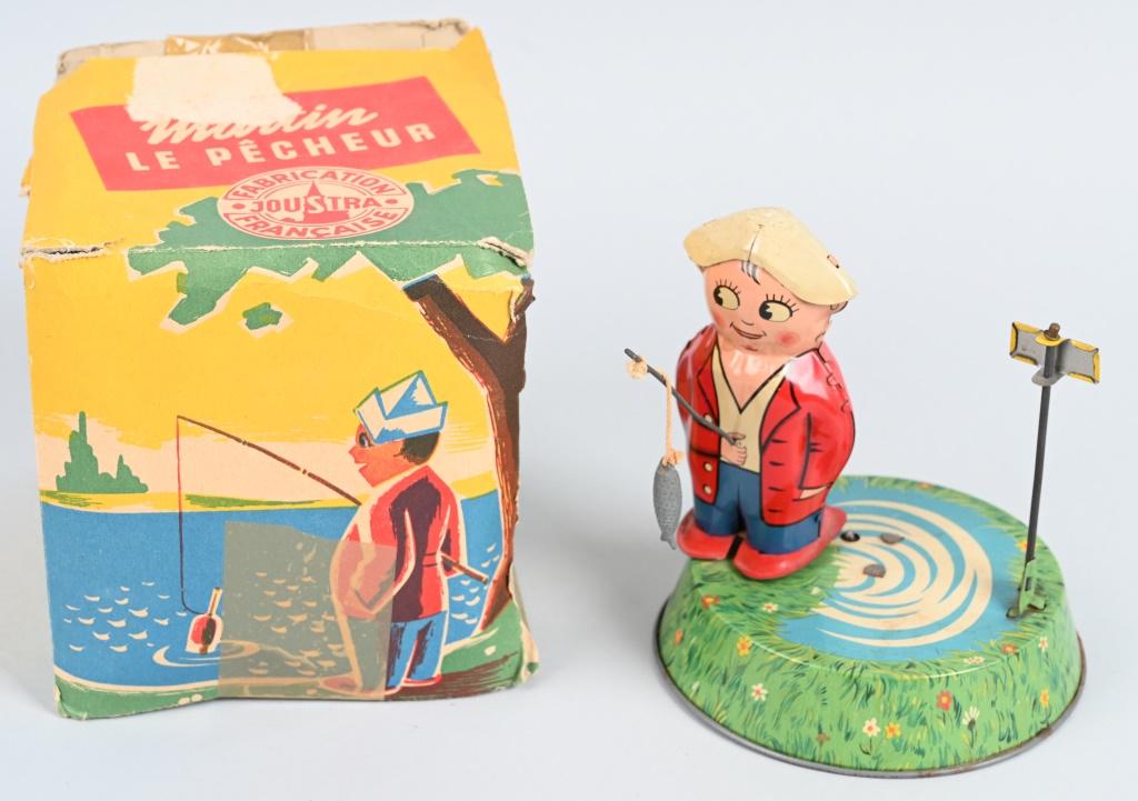 JOUSTRA TIN WINDUP FISHERMAN w/ BOX: All original and complete. Works. Boxed 6" Excellent