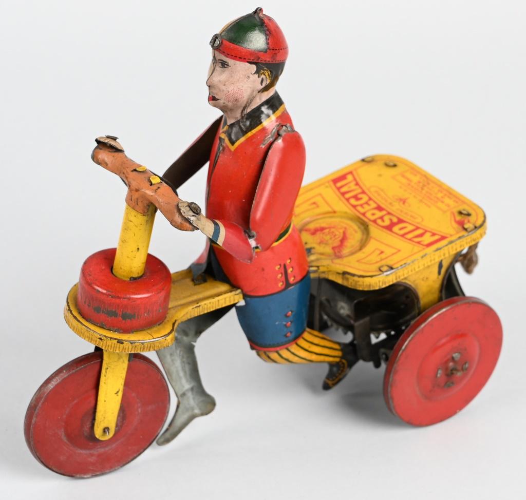 B&R TIN WINDUP KID SPECIAL: All original and works. Has pull string windup. 6 1/2" Excellent