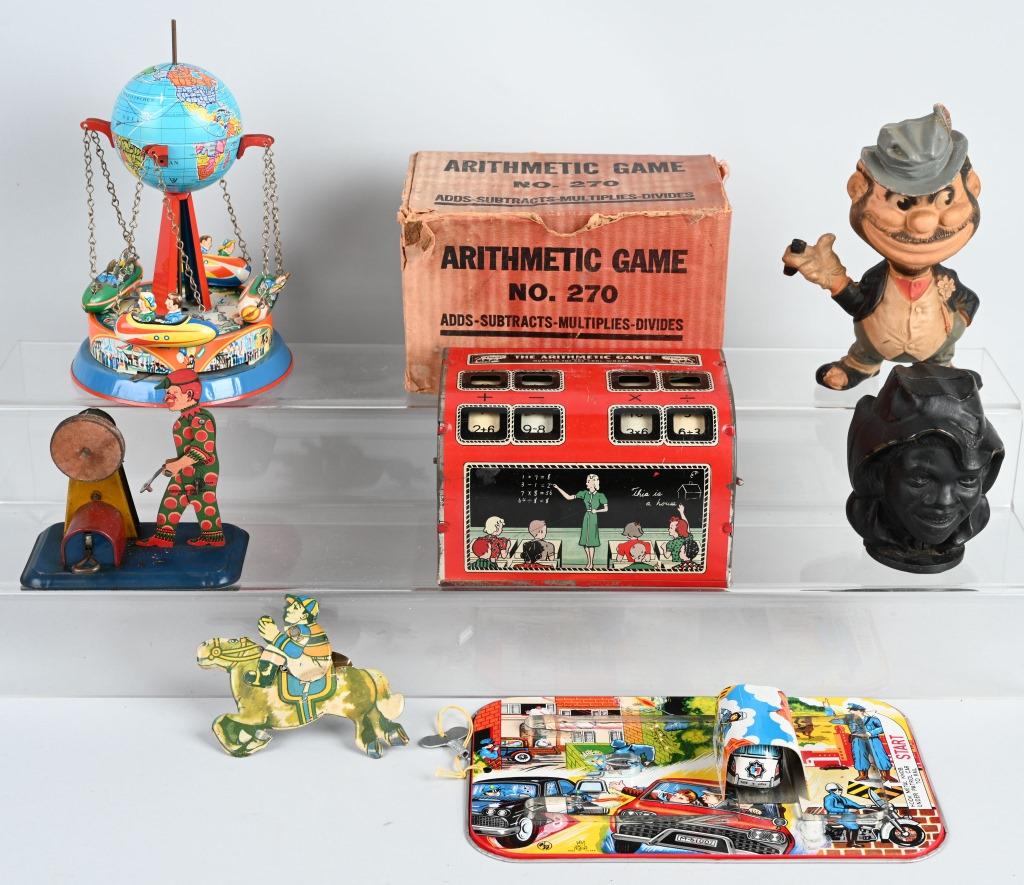 LOT OF VINTAGE TOYS & MORE: Includes rubber Brooklyn Bum, Windup Man with Sander, Police Car on Platform, Globe Go Round Toy, Jockey Clicker,Arithmetic Game with Box, and Double Face Boy Still Bank. Largest 8" Very Good-Excellen