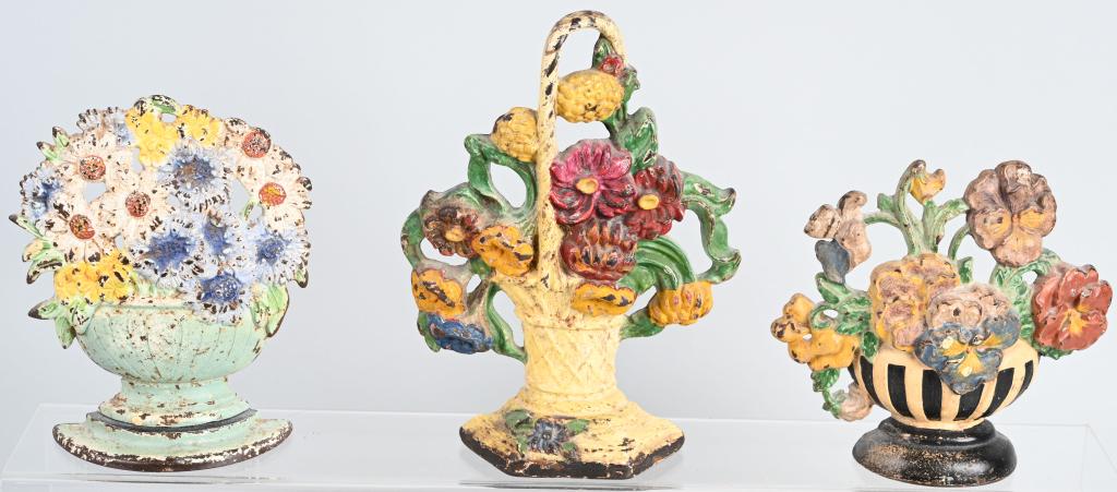 3- CAST IRON FLOWER BASKET DOOR STOPS: Nice lot of 3 original cast iron Flower Basket Door Stops. All with nice design and colors. Largest 9 1/2" Very Good-Excellent