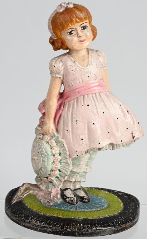 WAVERLY STUDIO GIRL w/ BONNET DOOR STOP: Scarce cast iron Waverly Studios Girl with Bonnet Door Stop. All original with nice paint. Has all marking on back. 8 1/2" Excellent