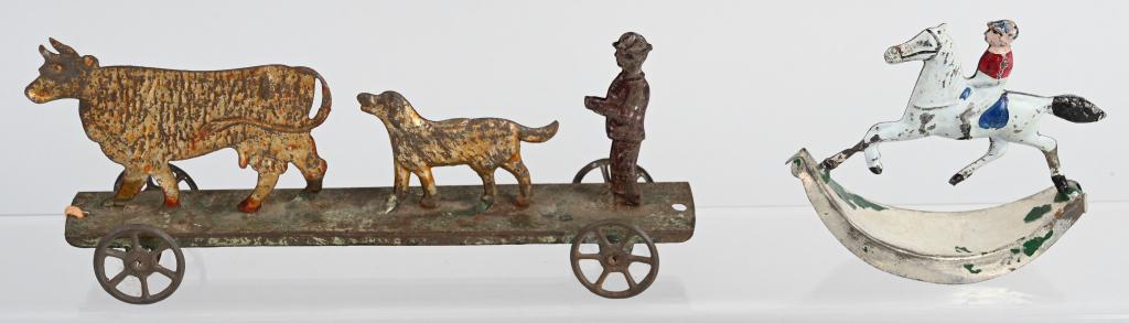 2- AMERICAN TIN TOYS 19th CENTURY: Lot includes a 4" Horse and rider on rocker, along with a scarce 7 1/2" platform toy with a Man, Dog and Cow. Both have wera and paint loss. Good-Very Good