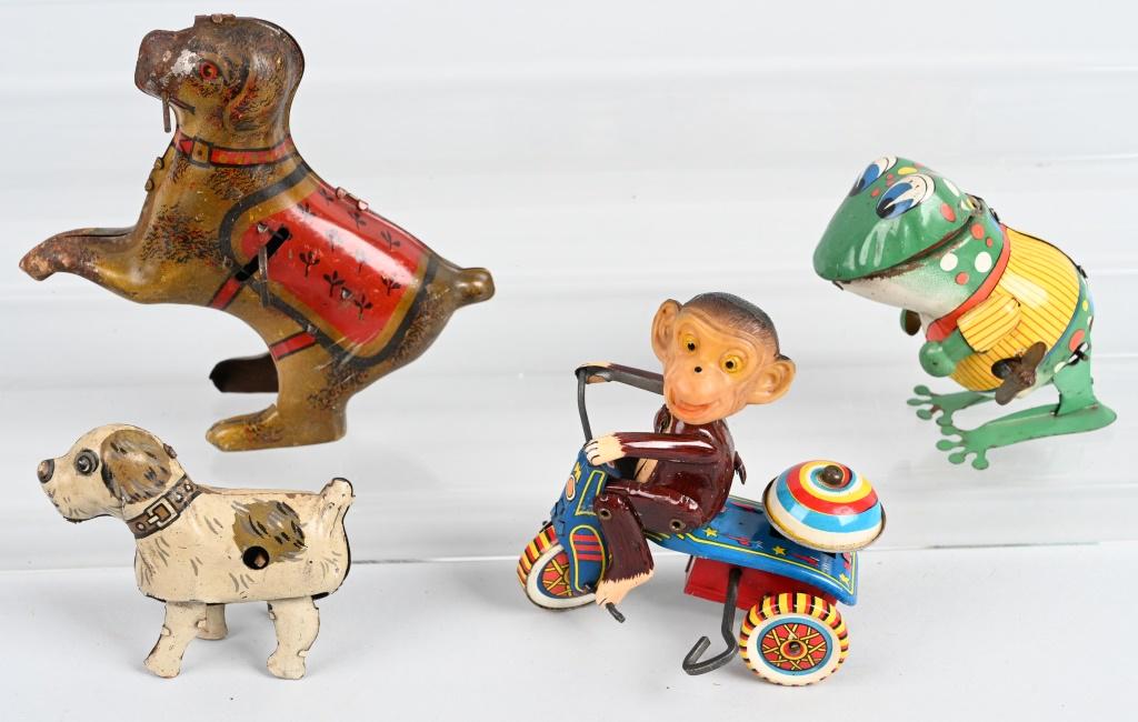 4- VINTAGE tin windup TOYS: Lot includes a pre war Lindstrom Dancing Dog, Japan Walking Dog, Monkey on Tricycle and Hopping Frog. All worked when tested. Condition varies. Largest is 5 3/4", Very Good-Excellent