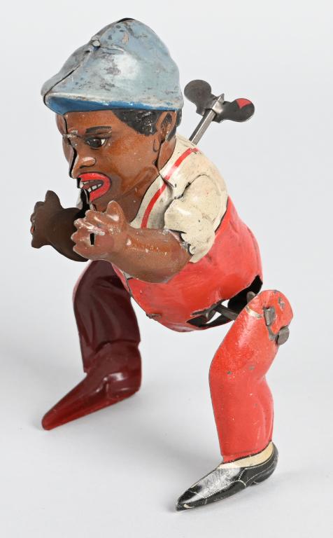 GUNTHERMANN TIN WINDUP POOR PETE: Great early German toy. Nice colors and windup works. Missing dog and watermelon. 6" Excellent