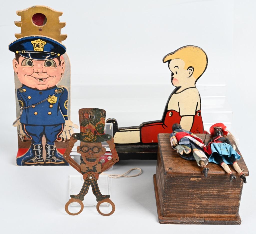 VINTAGE TOY LOT and MORE: Lot includes Skeezix wood pull toy, Ives Dancers with new clothes and replaced base, a 10 1/2" heavy cardboard signaling Policeman, and a German tin Scissors man. Condition varies. Good-Very Good