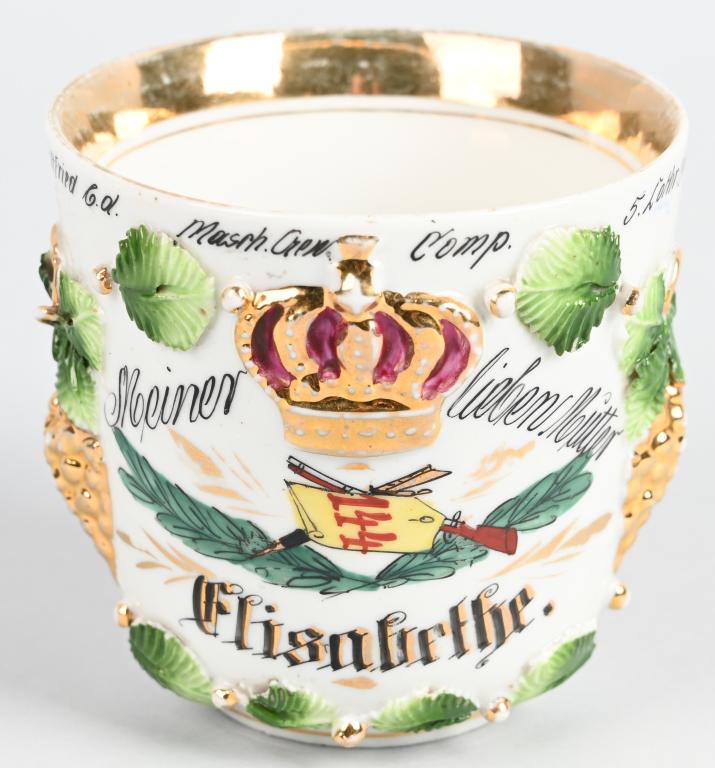 WW1 IMPERIAL GERMAN 144th REGIMENTAL CUP 1912 METZ: Imperial German Regimental cup of 144th company and was a gift to his Loving Mother in 1912. This regiment was based out of Metz and depicts life in the service with ornate laurel leaves and a Gold Ki