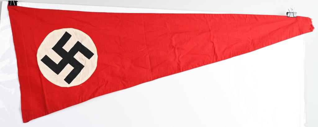 WWII NAZI GERMAN NSDAP SMALL BANNER OR FLAG WW2: Multi-piece cotton construction banner approximately 19 X 45 inches. To both its red fields are sewn white disks, with a printed mobile swastikas in black. Shows the expected period use and wear with 