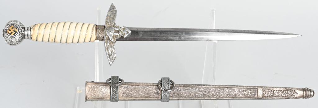 WWII NAZI GERMAN LUFTWAFFE OFFICER DAGGER WW2: Roughly, 29cm long, bright, nickel/silver plated, double edged, drop forged steel, stiletto style blade with a flat central plane. The leather washer is still intact. The dagger has a well defined, ni