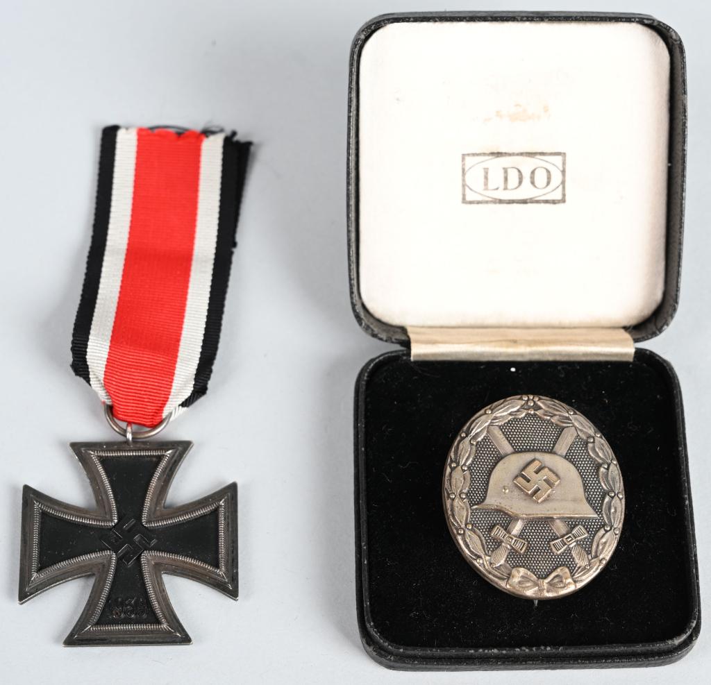 WWII NAZI EKII MKD 06 CASED SILVER WOUND BADGE 65: WWII Nazi German lot of military medals to include 1) Ringed marked 06 Iron Cross 2nd Class by Fritz Zimmermann. 1939 pattern, die struck, three piece, iron and alloy construction Pattée style cross 