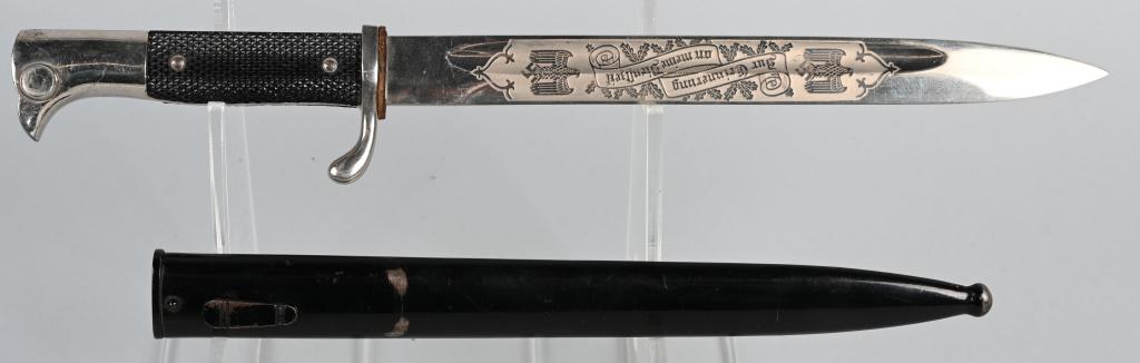 WWII NAZI GERMAN SINGLE ENGRAVED BAYONET EICKHORN: Roughly a 10 inch long nickel/silver plated drop forged steel construction blade with deep narrow fullers to each side a top edge swedge to the forward tip and an acid etched design to the obverse. Bl