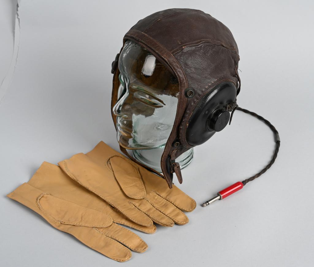WWII A-11 FLIGHT HELMET & USN LEATHER PILOT GLOVES: WWII US Army Air Corps Leather Type A-11 intermediate flying helmet size medium was standardized on August 6, 1943 and became one of the most popular and widely utilized helmets during World War II. T