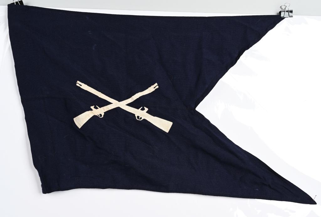 WWII US ARMY INFANTRY REGIMENT GUIDON FLAG: WWII US Army Infantry Regiment Guidon or flag measuring 21 X 28 inches being made of blue wool with white linen crossed rifles with a few scattered moth holes. Excellent