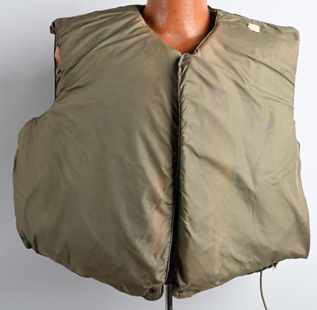 VIETNAM WAR M-1952A FLAK BODY ARMOR VEST: This is a classic M1952A Body Armor vest offered in very good condition with data table that reads: ARMOR, VEST, M-1952A large L.W. FORSTER SPORTSWEAR CO. INC. 23 APRIL, 1954 Q.M. 65 C-54 N.Y.Q.M.P.A.