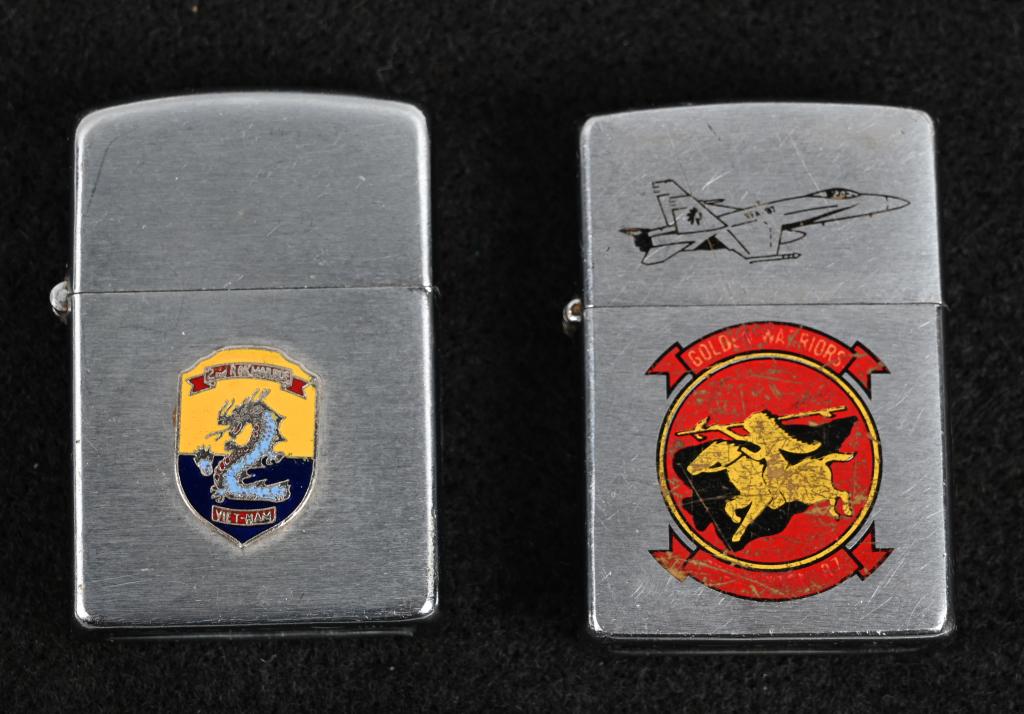 VIETNAM PRESENTATION CIGARETTE LIGHTER ZIPPO LOT 2: Lot of two Vietnam era engraved lighters including 1) Zippo brand lighter engraved to VFA-87 "Golden Warriors" Strike Fighter Squadron 87. In June 1968, the squadron was established as VA-87, an attac