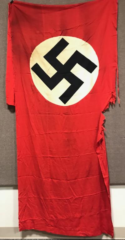WWII NAZI GERMAN NSDAP WALL BANNER OR LARGE FLAG: Large multi-piece cotton construction banner approximately 48 x 150 inches. To both its red fields are sewn an 80cm diameter white disks, with a printed mobile swastikas in black. Original bunting sti