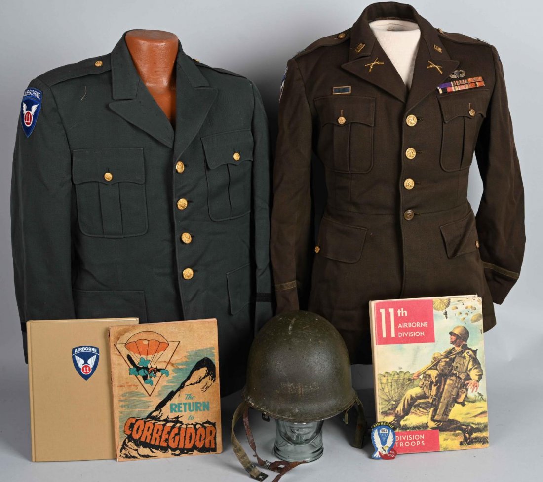 WWII 503rd PARATROOPER GROUPING 11TH AIRBORNE: Uniforms, books, insignia and M1-C Airborne Helmet , rear seam swivel bale with green and khaki "A" yoke, OD Green sewn chinstraps, grouping, all named to one career Army infantry officer who began as