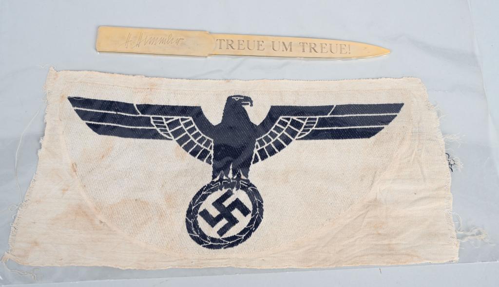 WWII NAZI GERMAN H. HIMMLER LETTER OPENER LOT: WWII Nazi German Repro Heinrich Himmler presentation letter opener measuring 8 5/8 inches. On the obverse is the inscription Hans Backer SS-Sturmbannfuhrer 28.3.43 Meine Thre Heisst Treue and on the r