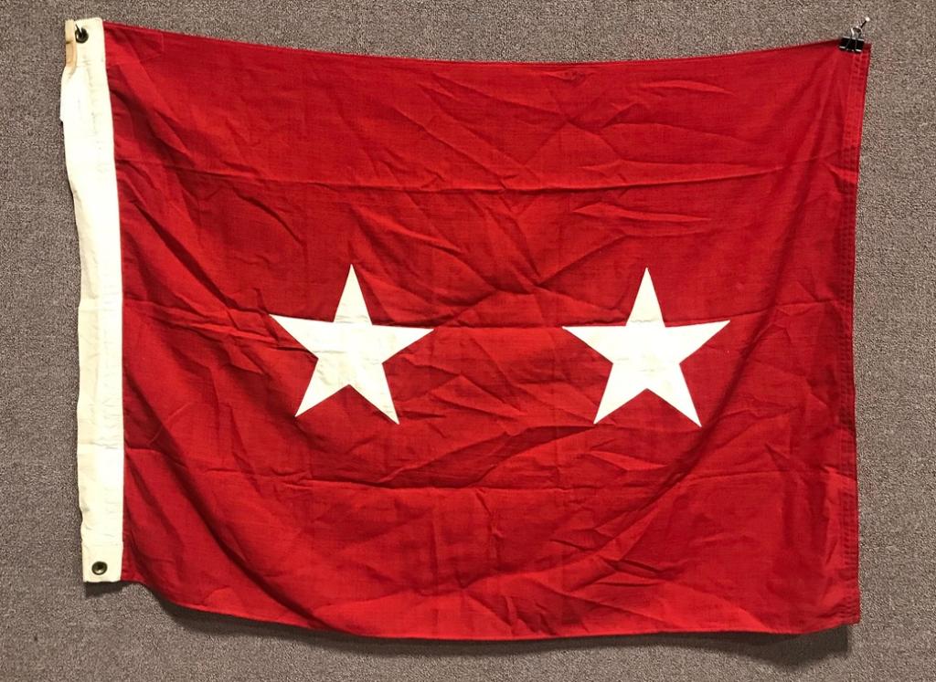 US ARMY USMC MAJOR GENERAL'S FLAG 34 X 49 INCHES: Major General's flag measuring 34 X 49 inches being multi piece construction with a red background with two white stars separately applied to the center. Flag is in excellent condition and dates to 19
