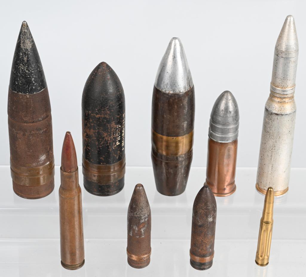8 PICE COLLECTION VINTAGE MILITARY INERT ORDNANCE: *INERT* Includes a 1943 dated projectile for the M3 Anti-Tank gun, marked M51B1 at the collar, with a black painted tip. Also includes a 37mm antitank round, a Vietnam era dummy M51A2 20mm round, a 20