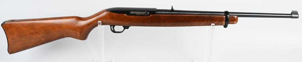RUGER 10-22 SEMI AUTO RIFLE: SERIAL 127-02142. BARREL 18". CALIBER .22 LONG RIFLE. Fed via a rotary magazine (missing), these are considered one of the most reliable semi auto .22 rifles ever made. Features black enamel frame and