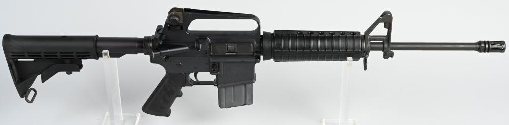 COLT AR-15 A2 SEMI AUTO GOVT CARBINE: SERIAL LLC001567. BARREL 18". CALIBER .223. It is a Canadian manufactured AR. Which makes the gun extremely rare. Features retractable stock, pistol grip, round fore-arm, standard military sights, fla