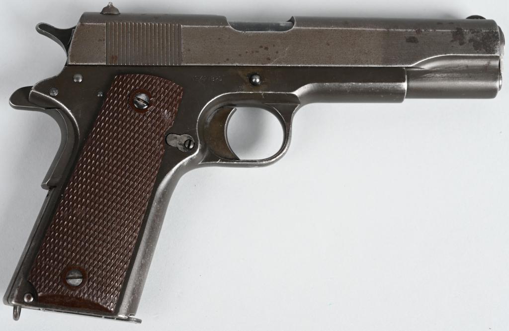 COLT 1911 WWII REBUILT SEMI AUTO PISTOL: SERIAL 427820. BARREL 5". CALIBER .45 ACP. FRAME MADE IN 1918. Typical WWII rebuild of a WW1 Colt Model 1911 with parkerized finish, a W W II hammer, Keyes type plastic grips, replaced barrel with WW1