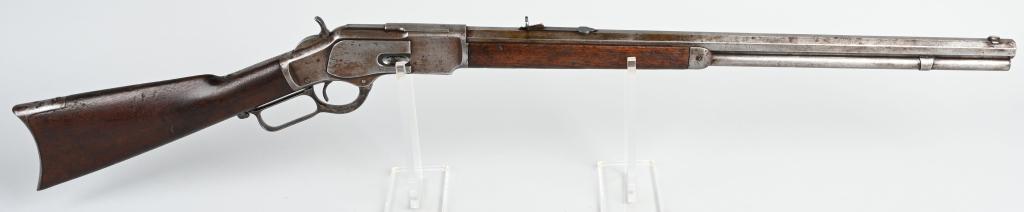 WINCHESTER MODEL 1873 .44 RIFLE: SERIAL 508011. BARREL 24". CALIBER 44 WCF. MADE IN 1897. Standard octagon barrel rifle with full magazine, Winchester semi buckhorn rear sight, walnut stocks and rifle butt plate. All metal is gray pa