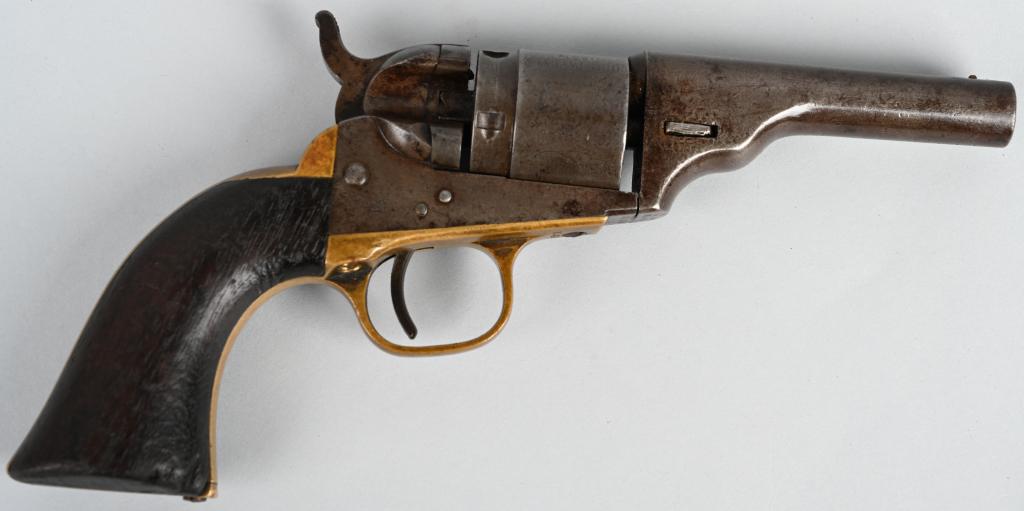 COLT CONVERSION 3 1/2 ROUND W/O EJECTOR: SERIAL 313989. BARREL 3 1/2". CALIBER .38 CF. MADE 1873-1880. This is one of about 3500 made as a cartridge gun from old percussion and newly made parts. it features a rebated cylinder, no factory loa