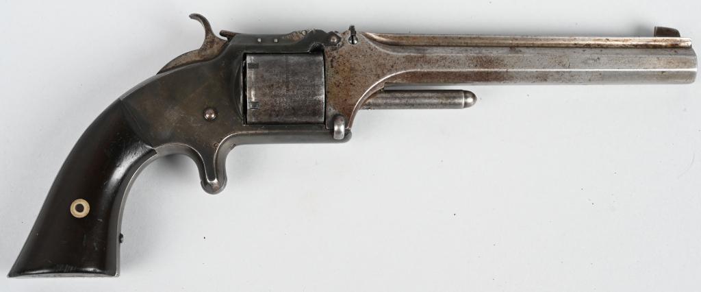 SMITH & WESSON NUMBER 2 ARMY TIP UP REVOLVER: SERIAL 16510. BARREL 6". CALIBER .32 RIMFIRE LONG. Made from 1861-1874. Features a tip up frame, octagon barrel, six shot single action, spur trigger with lovely rosewood two piece grips. Frame is sil