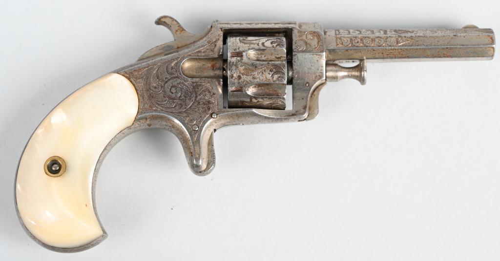 FACTORY ENGRAVED FAVORITE NO 1 POCKET REVOLVER: SERIAL NSN BARREL 2.5". CALIBER .22 RIMFIRE. While not maker marked, the engraving is turn of the century scroll It is a 7-shot, single action with exposed hammer and spur trigger. Grips are real MOP,