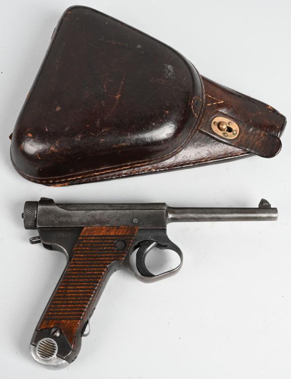 JAPANESE TYPE 14 NAMBU SEMI AUTO PISTOL: SERIAL 48572. BARREL 4.61". CALIBER 8X22. The Type 14 was the most widely used handgun by Japanese forces during the Second World War. This gun was made at the Nagoya factory. Year code 19.1. Both of 