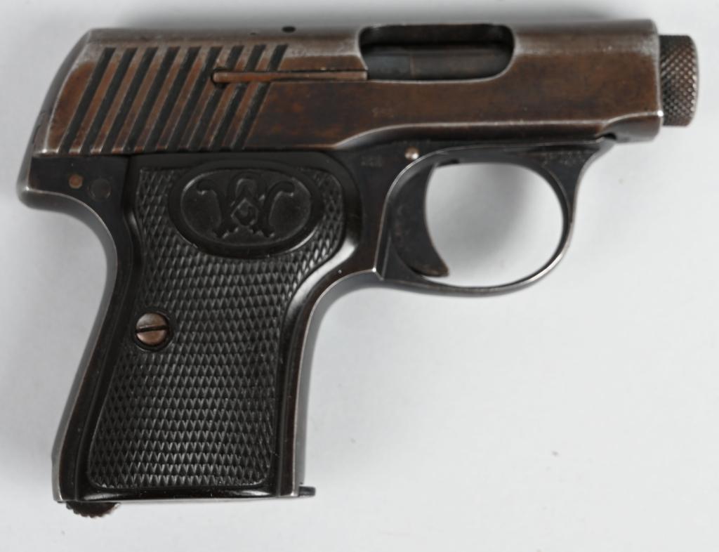 PRE-WAR WALTHER MODEL 2 VEST POCKET PISTOL: SERIAL 10566. BARREL 2". CALIBER 6.35. Second Variant Model 2. The second variant has no rear sight at all--merely a groove down the top of the slide with a tiny front sight that does not rise above t