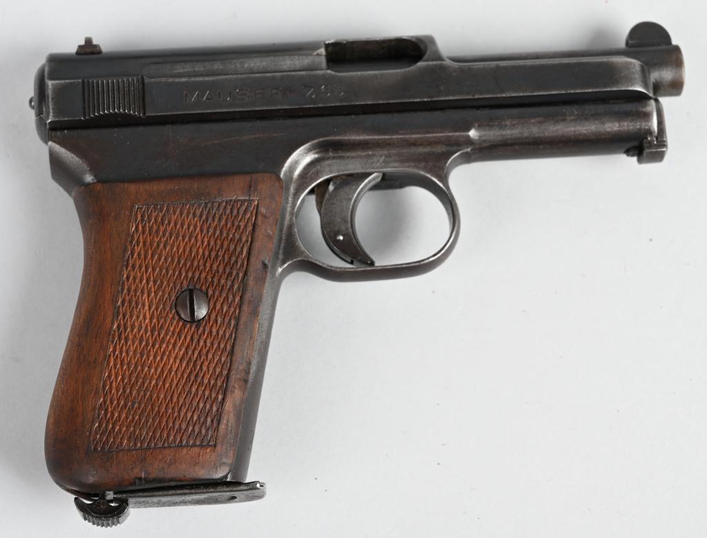 MAUSER MODEL 1914 SEMI AUTO PISTOL: SERIAL426844. BARREL 3 1/4". CALIBER 7.65. This example features the late small banner, flush front sight, wind drift rear sight, blue finish, checkered walnut grips and comes with one matching serial