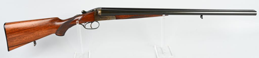 J. P SAUER & SOHN DOUBLE BARREL SHOTGUN: SERIAL 280699. BARRELS 26". BORE 12. CHAMBER 2 3/4". CHOKE IMP / MOD. LOP 14 1/4". Made in West Germany and imported by Stoeger. Features manual eject, sold matted rib, all matching numbers, Nitro pro