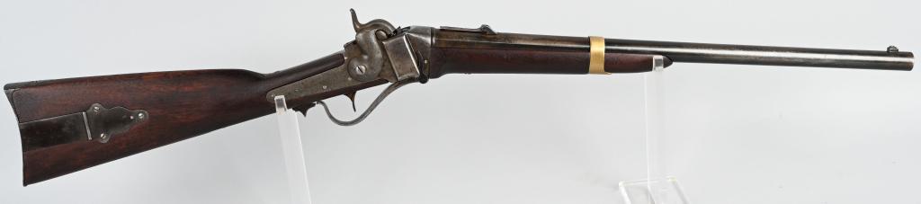 1853 MODEL SLANT BREECH SHARPS CARBINE: SERIAL 12864. BARREL21.5". CALIBER .52. This carbine is often referred to as John Browns Sharps or Beecher's Bibles. Slant breech percussion carbine with long sling bar, brass barrel band with all oth