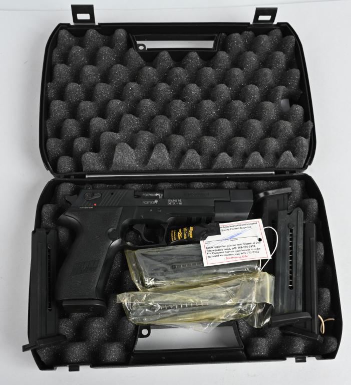 CASED SIG ARMS MOSQITO SEMI AUTO PISTOL: SERIAL F037909. BARREL 5". CALIBER .22 LONG RIFLE. Featuring a polymer frame chambered in 22LR, the Mosquito is 90% the size of a P226. " The slide features adjustable sights, and along with the rugge