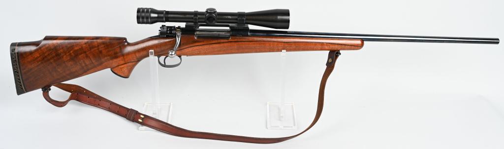 GRANT DICK CUSTOM MAUSER SPORTING RIFLE: SERIAL 37434. BARREL 24". CALIBER .220 SWIFT. Custom rifle that is based off an original Mauser action fitted with a Grant Dick stamped .220 barrel sans any barrel sights, a lovely piece of fine Walnu