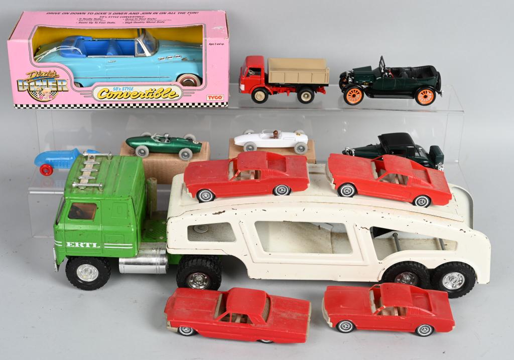 LOT OF VINTAGE TOY VEHICLES: Includes Pressed steel car hauler with cars, Racers with boxes, Old timer cars, and more