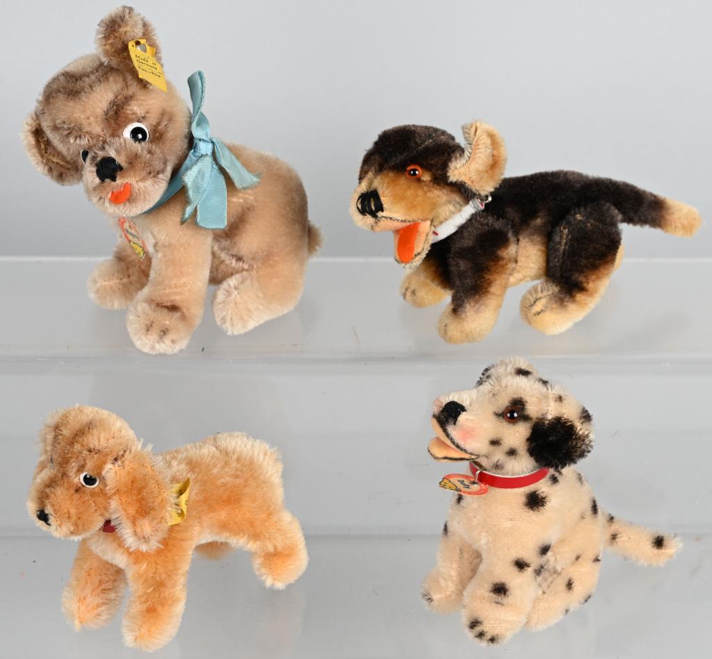 4- VINTAGE STEIFF DOGS: Nice lot of Vintage Steiff Dogs. Largest 6" Excellent