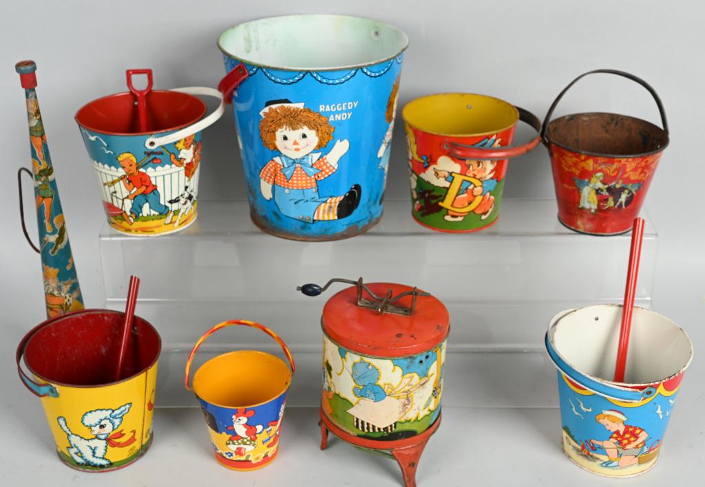 LOT OF SAND PAILS & MORE: Sand Pails includes Raggedy Ann. Washer machine, and Horn. Largest 8 1/2" Very Good-Excellent