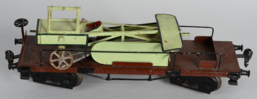 MARKLIN 1 GAUGE AIRPLANE FLATCAR: Pre-War Marklin 1 Gauge Airplane Flat Car. All original condition. Excellent original paint. Airplane has all its parts. Nice example of hard to find Marklin Train Car. 13" Excellent