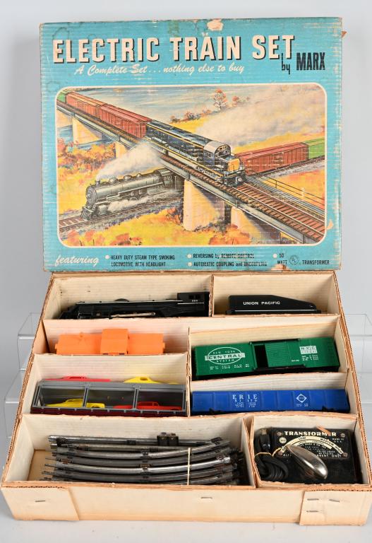 MARX No. 52278 STREAMLINE TRAIN SET w/ BOX: O-gauge train set includes streamline locomotive, tender, car hauler and 4 cars, box car, gondola, and caboose. Set also has track and transformer. Box measures about 18" by 15". Untested. Excellent