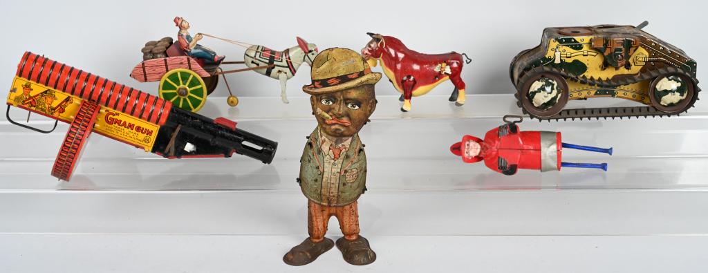 VINTAGE MARX Windup TOYS FOR PARTS: Lot includes a 1930 tin Marx Andy Walker with moving eyes, Plastic Climbing Fireman, a tin Hee Haw Milk Wagon, a Climbing Tank, 1938 Ferdinand the Bull, and 1930's Gman Machine Gun. All the windups wo