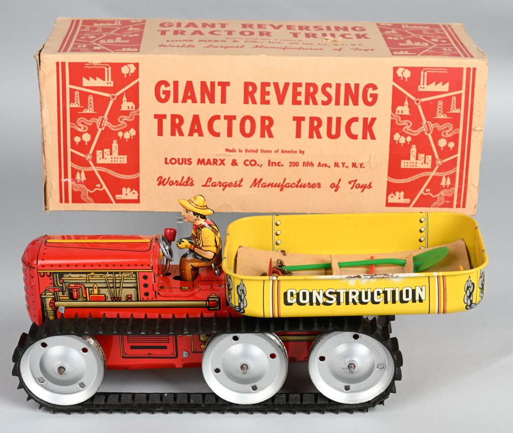 MARX Tin Windup GIANT REVERSING TRACTOR w/ BOX: All original Marx toy complete with tools on original card and driver. Worked when tested in forward and reverse. Box is complete except for one end flap. 14", Excellent
