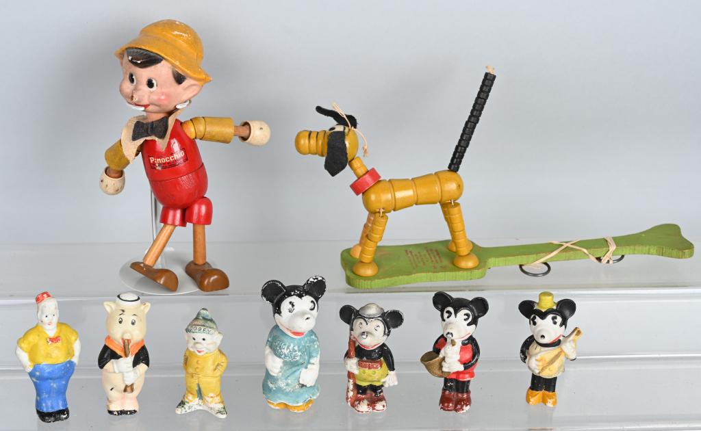 LOT of 1930'S DISNEY CHARACTERS: Lot includes Ideal Pinnochio wood jointed doll, Fisher Price Pluto, 4 Mickey Mouse Bisque figures, Dopey bisque figure, Three Little Pigs bisque figure,along with a Bisque Uncle Walt from the Gasoline