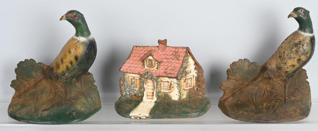 2- PHEASANT Cast Iron DOORSTOPS & COTTAGE: Lot includes 2- 8 1/2" Pheasant doorstops along with a cottage doorstop. Condition varies. Paint loss and wear. Good-Very Good