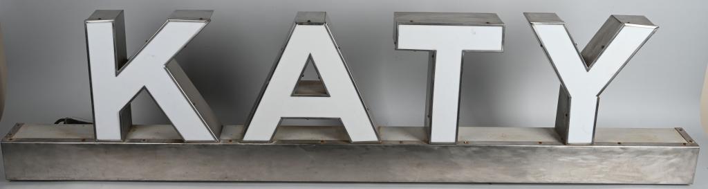 Missouri Kansas & Texas Railroad Lighted Sign: rated 9, 23"x92"x6", A Missouri Kansas & Texas (Katy) lighted sign. the can and letters are stainless steel the face of the letters is plastic, lights up and looks great.