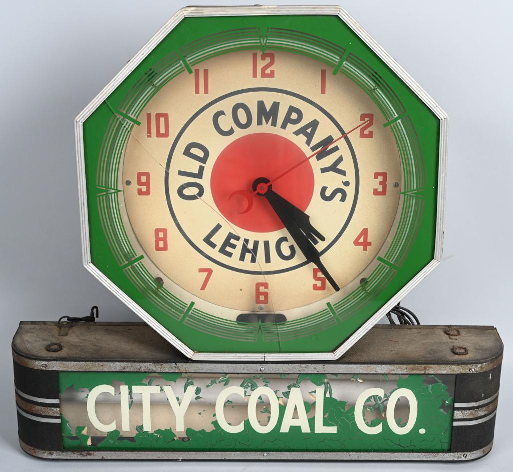 Old Lehigh Company (coal) Octagon Neon Clock: octagon neon clock is all original but does have a cracked lens, the bottom privilege panel is original to the piece, the City Coal Co. has paint loss, 25"x27"x7".