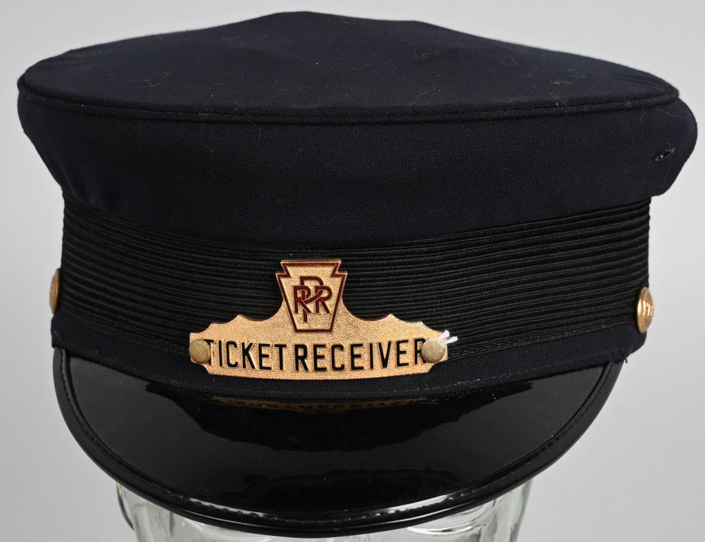 Pennsylania Rail Road Ticket Reciver Hat: cloth hat with vinyl bill & PRR Ticket Receiver enameled badge, size 7 1/4, all in very good condition